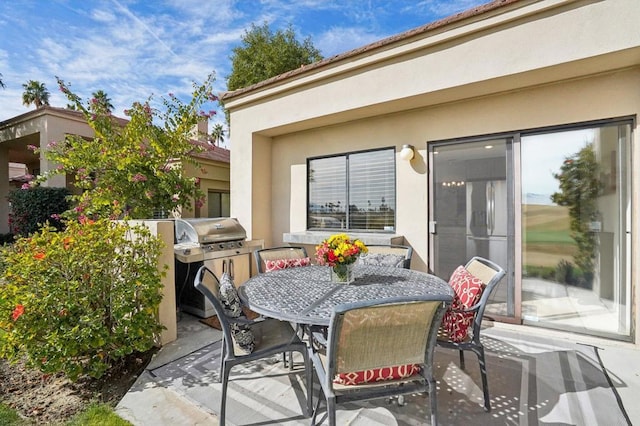 view of patio with area for grilling