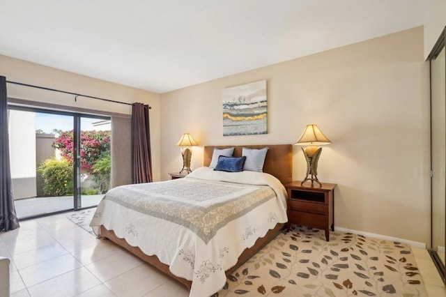 tiled bedroom featuring access to exterior