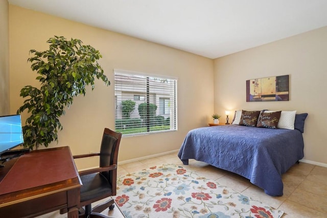 bedroom with light tile patterned flooring