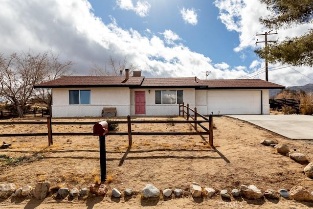 ranch-style home with a garage