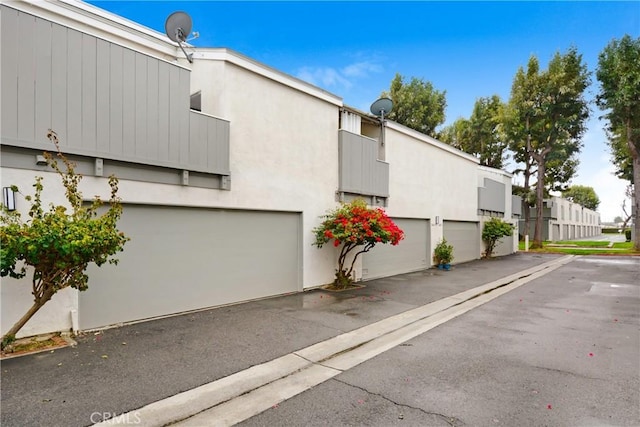 exterior space with a garage