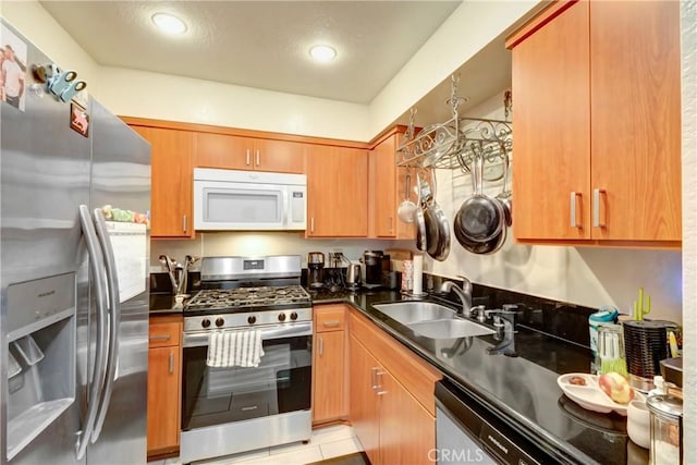 kitchen featuring appliances with stainless steel finishes and sink