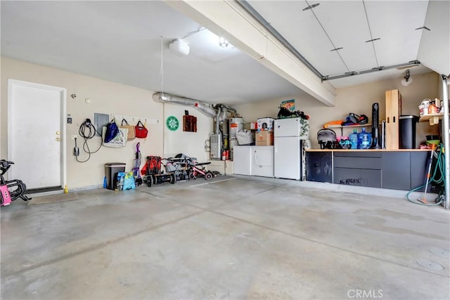 garage with white refrigerator