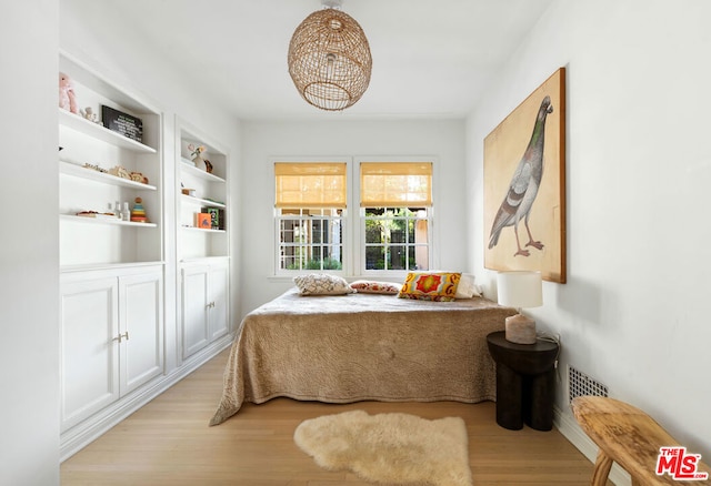 bedroom featuring light hardwood / wood-style flooring