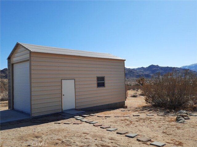 view of outdoor structure with a mountain view