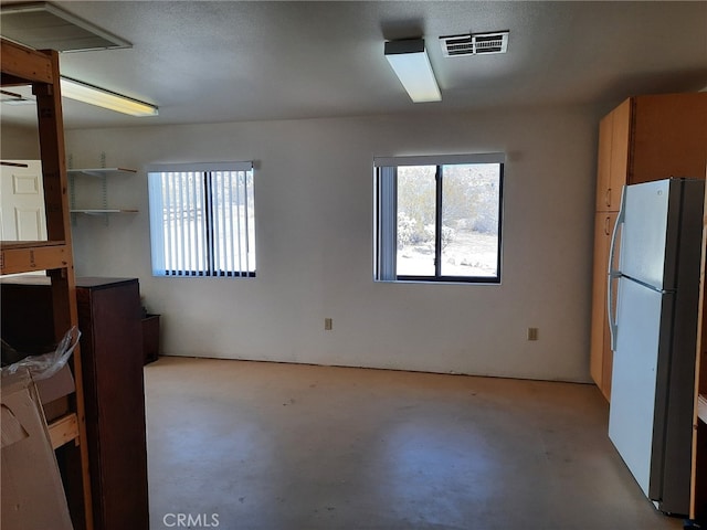 interior space with white refrigerator