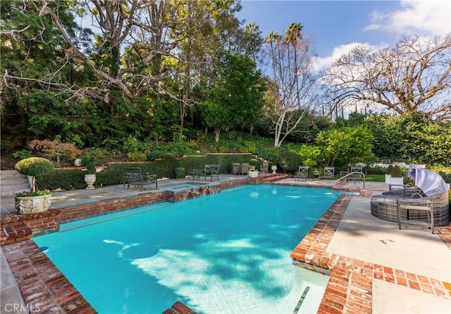 view of pool with a patio