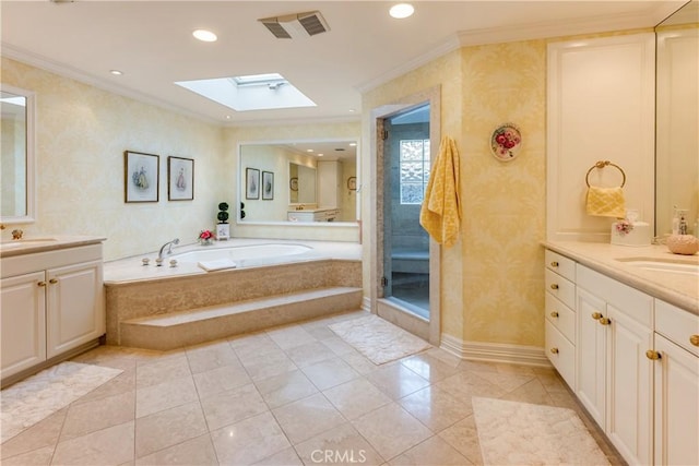 bathroom with vanity, a skylight, crown molding, tile patterned flooring, and separate shower and tub