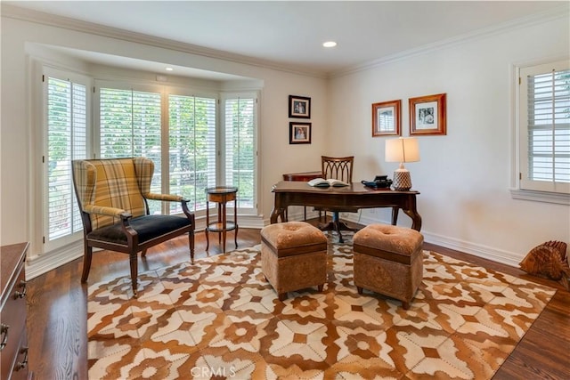 office space with light hardwood / wood-style floors and crown molding