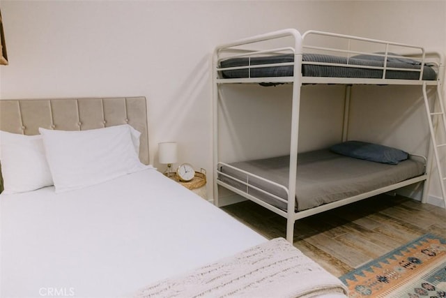 bedroom featuring hardwood / wood-style flooring