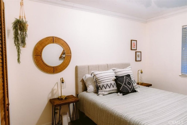 bedroom featuring ornamental molding