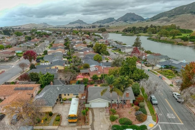 bird's eye view featuring a water and mountain view