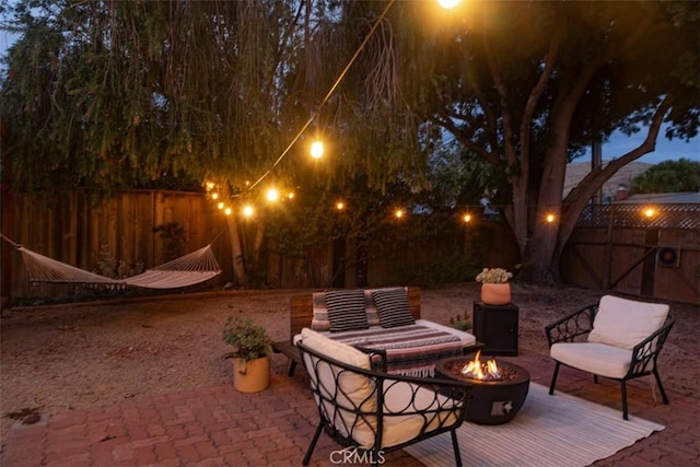 view of patio with an outdoor fire pit