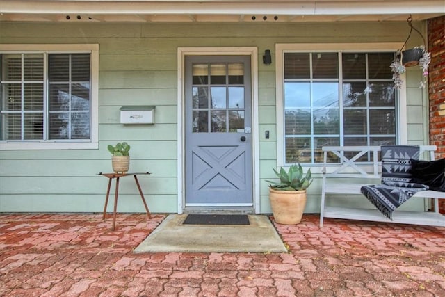 entrance to property with a porch