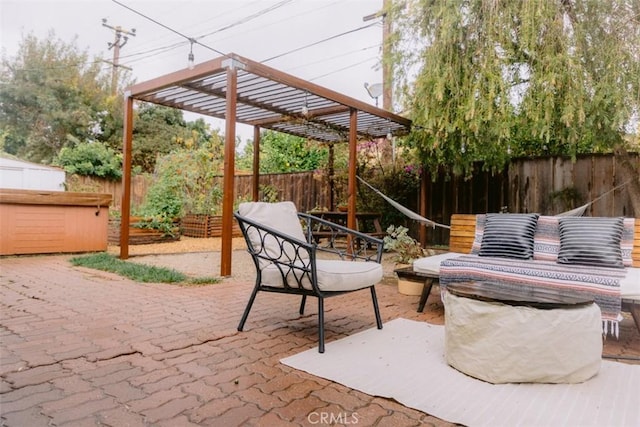 view of patio / terrace featuring a hot tub, outdoor lounge area, and a pergola