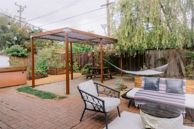 view of patio / terrace featuring outdoor lounge area and a pergola