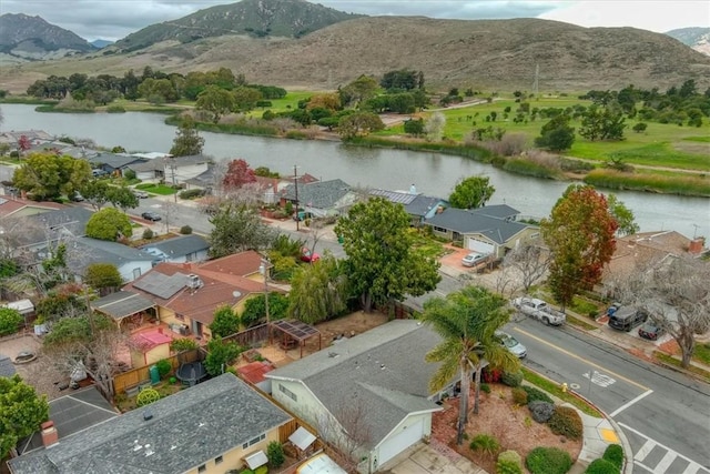 bird's eye view featuring a water and mountain view