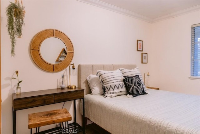 bedroom featuring crown molding