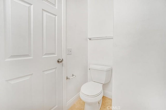 bathroom featuring toilet