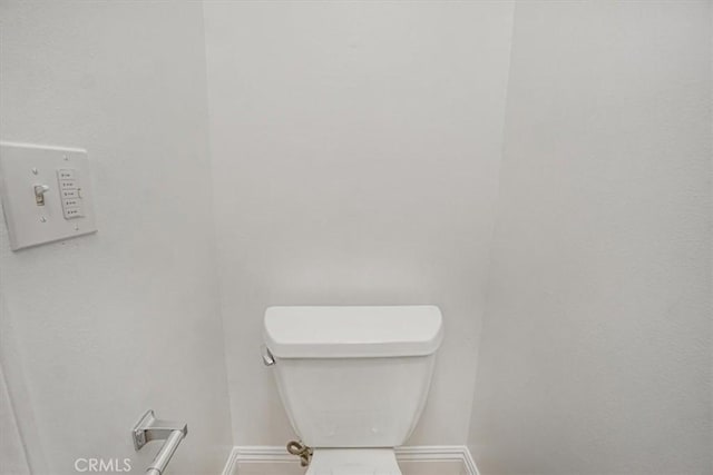 bathroom featuring toilet