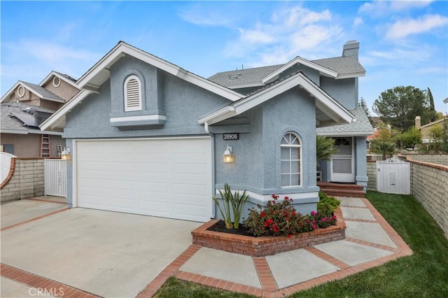 view of front of property featuring a garage