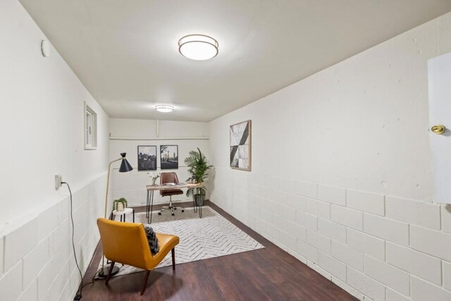 living area featuring hardwood / wood-style floors