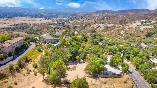 bird's eye view with a mountain view