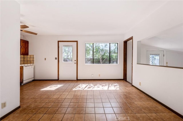 doorway to outside featuring light tile patterned flooring