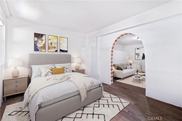 bedroom featuring dark wood-type flooring