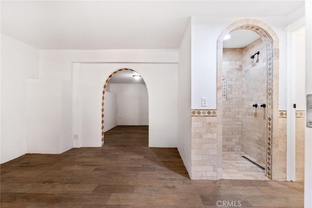 hallway featuring hardwood / wood-style flooring