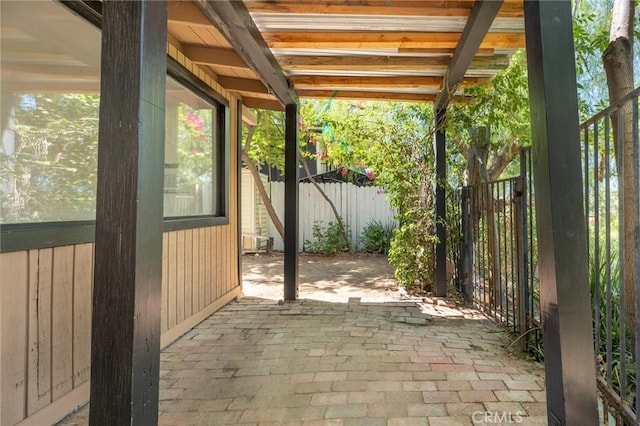 view of patio featuring a water view