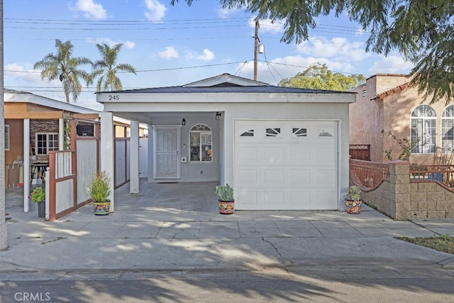 ranch-style home with a garage