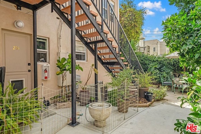 property entrance with a patio area