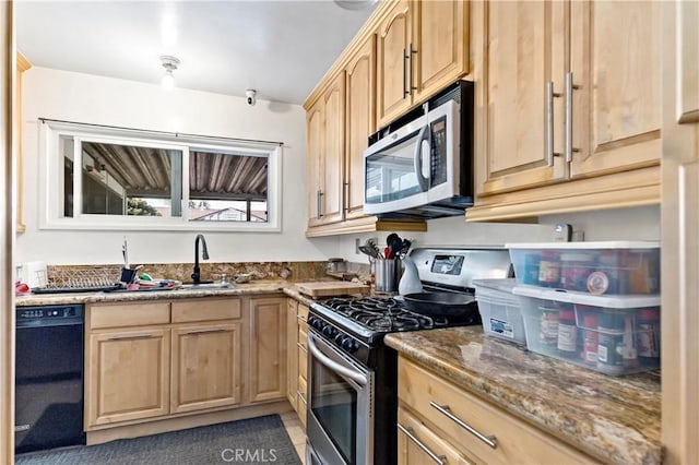 kitchen featuring sink, light brown cabinets, stainless steel appliances, light stone countertops, and tile patterned flooring