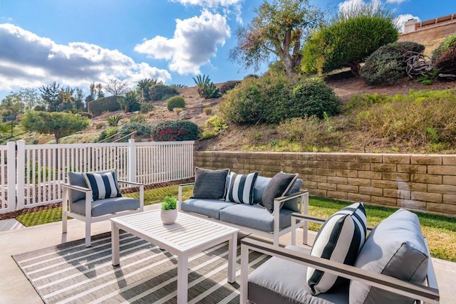 deck featuring outdoor lounge area and a patio area