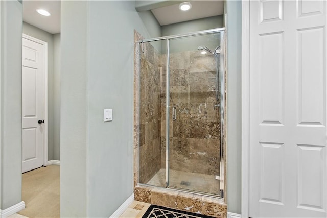 bathroom featuring an enclosed shower