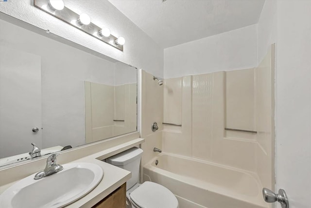 full bathroom featuring vanity, tub / shower combination, and toilet