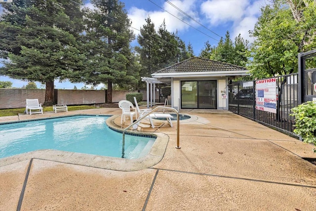 view of pool with a patio