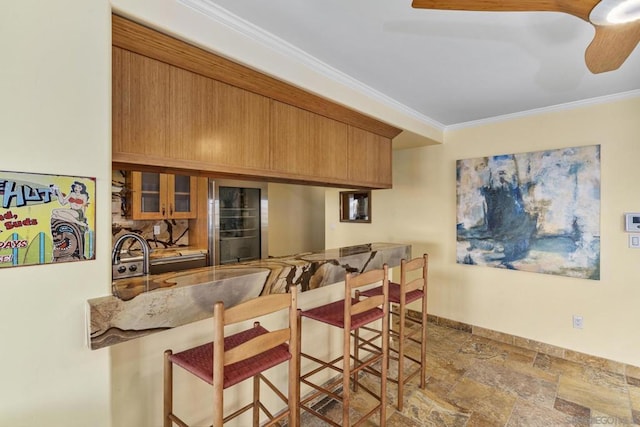 kitchen featuring crown molding