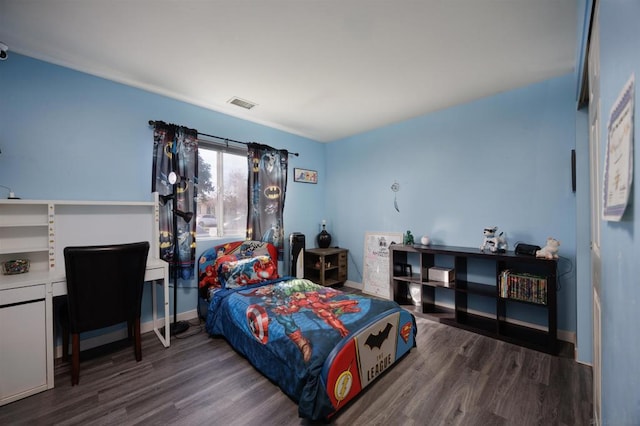 bedroom featuring dark wood-type flooring