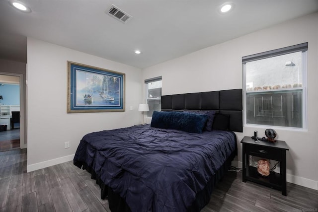 bedroom featuring dark wood-type flooring