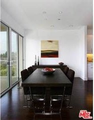 dining area with dark hardwood / wood-style floors