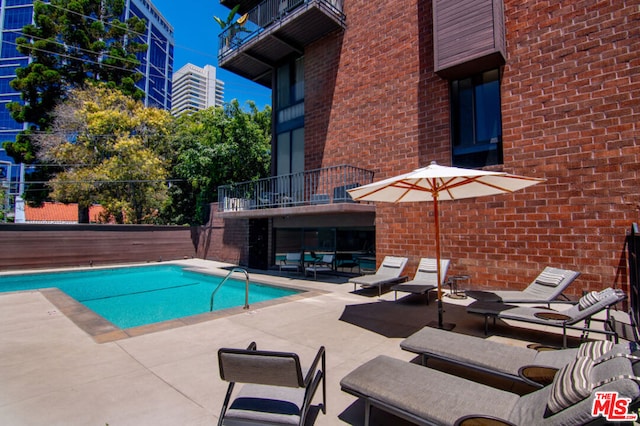 view of pool with a patio