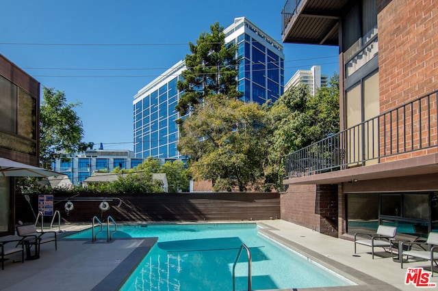 view of pool with a patio