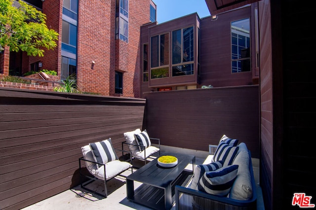 view of patio / terrace featuring a balcony