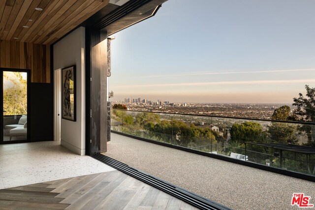 view of balcony at dusk