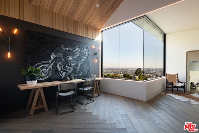 office space featuring hardwood / wood-style flooring and lofted ceiling