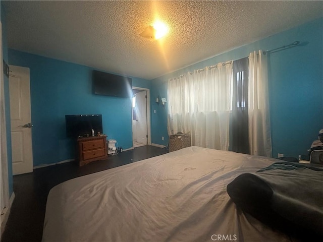 bedroom with a textured ceiling