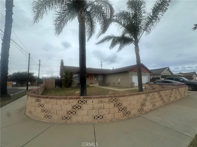 view of front of home with a garage