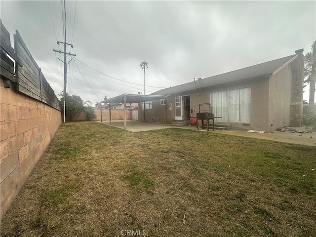 view of yard with a patio area